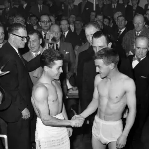 John Caldwell (right) shakes hands with young Martin, the Spanish boxer