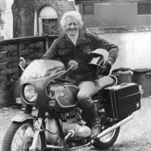 Jon Pertwee actor sitting on BMW motor cycle - April 1977 18 / 04 / 1977