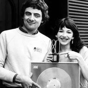 Kate Bush with Rowan Atkinson at NME awards October 1980