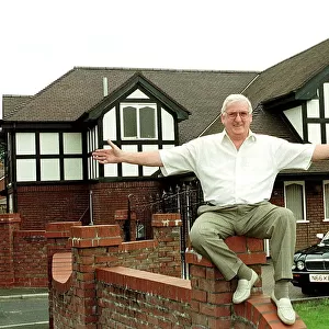 Ken White lottery winner pictured next to his new house and car won 6 million