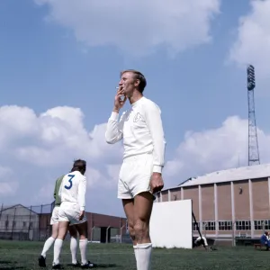 Leeds United footballer Jack Charlton smoking a cigarette during a training session