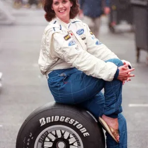 LESLEY FITZ SIMONS TAKE THE HIGH ROAD ACTRESS SITTING ON A BRIDGESTONE TYRE AT