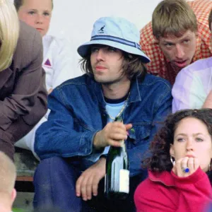 Liam Gallagher drinking wine - May 1996 Oasis v Blur football match Played at