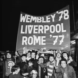 Liverpool fansleave Lime Street railway station for West Germany where their team will