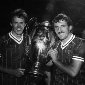 Liverpool FC players Phil Neal and Alan Kennedy with the European Cup