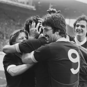 Liverpool Football team celebrate winning the League title after defeating Aston Villa