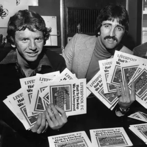 Liverpool players David Fairclough, David Johnson and Steve Heighway sign copies of