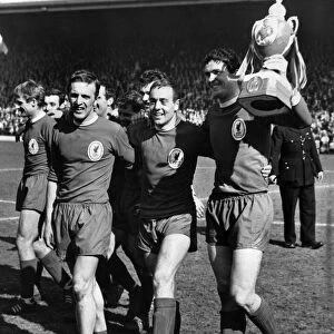 Liverpool players Peter Thompson, Ian St John and club captain Ron Yeats celebrate with