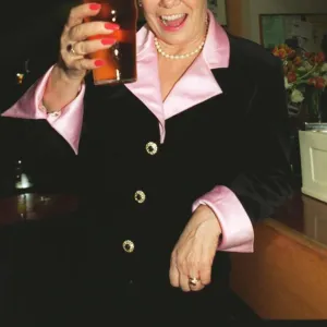 Liz Dawn Vera Duckworth of Coronation Street raises a glass to celebrate her taking over