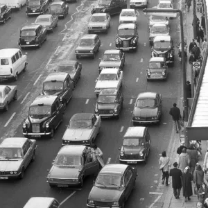 London traffic in Knightsbridge looking towards Hyde Park Corner. 6th January 1979