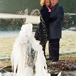 Magician Paul Daniels and his wife Debbie McGee pictured at home. 13th December 1991