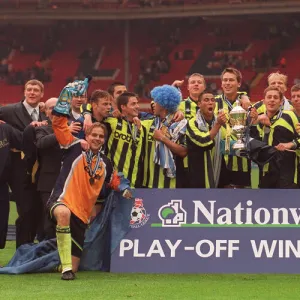 Manchester City celebrate their win May 1999 over Gillingham in