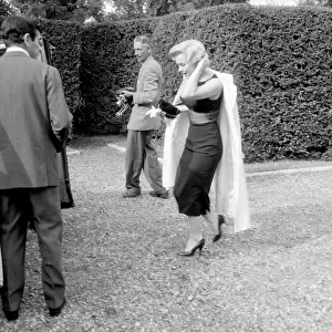 Marilyn Monroe with husband Arthur Miller in Englefield, Surrey. July 1956