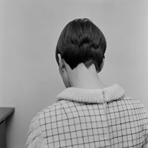 Mary Quant (pictured) turning round to show the camera the back of her head