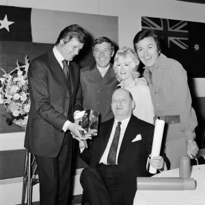 Media Mogul Lew Grade holds the Queens Award for Industry trophy won by ATV