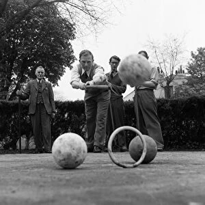 Men playing a game of Pall Mall (also known as Paille Maille) in Hampstead