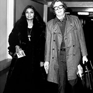 Michael Caine actor with wife Shakira at airport - December 1972 Dbase