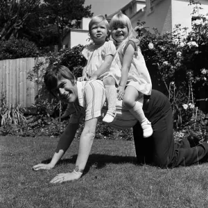 Mike Yarwood with his daughters Charlotte and Claire. 8th July 1974