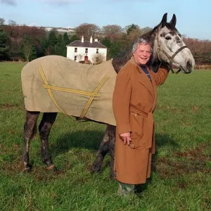 Oliver Reed Print: Actor in Brown Coat with Horse Bobby in Irish Field Oliver Reed Print: Actor in Brown Coat with Horse Bobby in Irish Field