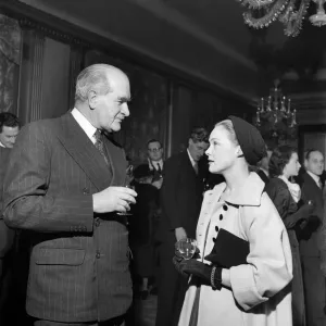 Vintage Print of Woman in Long Coat at Cocktail Party