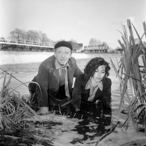 Black and white photograph print of Cyd Hayman in the river during filming