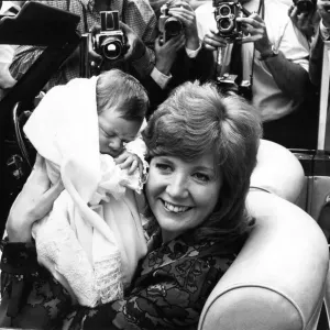 Print of Cilla Black leaving Avenue Clinic with 10-day-old son Robert John Print of Cilla Black leaving Avenue Clinic with 10-day-old son Robert John
