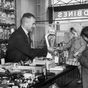 Harold Larwood in Blackpool Sweet Shop Print 10th April 1949 Harold Larwood in Blackpool Sweet Shop Print 10th April 1949