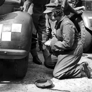 Princess Elizabeth Learning Car Maintenance Print 12th April 1945 Princess Elizabeth Learning Car Maintenance Print 12th April 1945