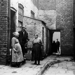 1933 Liverpool Print: Occupiers of No 3 Court with Canary 1933 Liverpool Print: Occupiers of No 3 Court with Canary