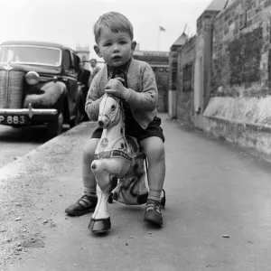 Two Year Old Peter Greenhill on Toy Horse, 1954 Print