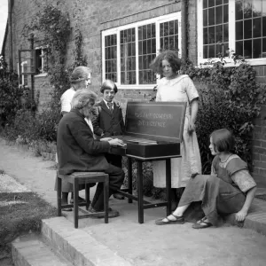 Arnold Dolmetsch Family at the Harpsichord, 1924 Print Arnold Dolmetsch Family at the Harpsichord, 1924 Print