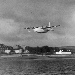 A Sunderland Flying Boat Print over Neyland Village