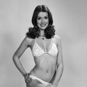 Miss UK and World 1974, Helen Morgan poses in the studio. 24th November 1974