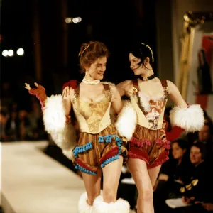 Model on the cat walk moddeling Vivienne Westwood designs at a fashion show waspies