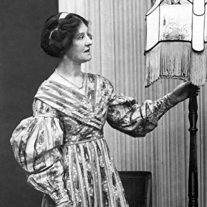 A model showing of a dress from the 1820s a hundred years later in 1920
