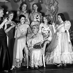 Mrs Laura Henderson owner of the Windmill Theatre with some of the Windmill Revudebelles