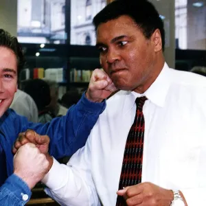 Muhammad Ali ex world champion boxer with Ally McCoist from Rangers Football Club