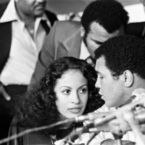 Muhammad Ali at the post match conference with wife Veronica. September 15, 1978