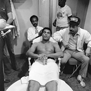Muhammad Ali relaxing ahead of his second fight with Leon Spinks to be held at