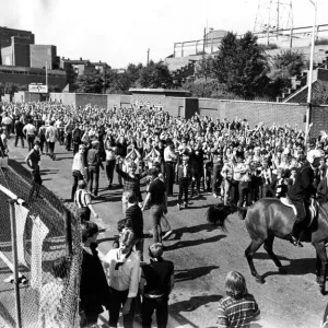 Newcastle Supporters - Police on horse back control the Newcastle supporters outside St