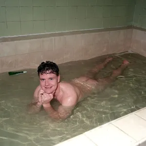 Newcastle United footballer Paul Gascoigne in the bath naked in the dressing rooms at St