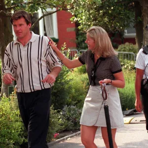 Nick Faldo Golfer with his girlfriend Brenna Cepelak by the clubhouse after his second