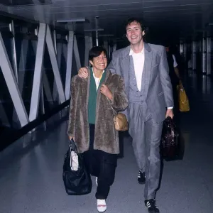 Nigel Planer Actor arriving at London Airport from Barbados with his wife Roberta Planer