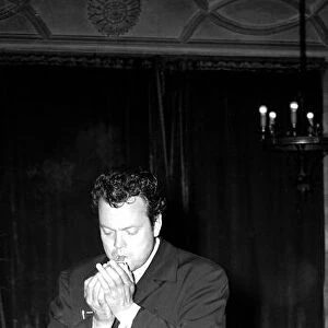 Orson Welles American Actor Film Producer - in London Hotel - smoking a cigar