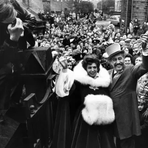 Pat Phoenix wedding at Broadbottom. Elsie Tanner and Alan Howard wave to the crowds after