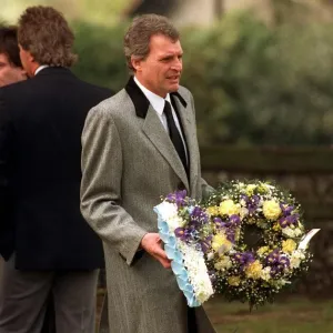 Peter Dean Actor carrying a wreath at the funeal of Mark Reid the son of Comedian Actor