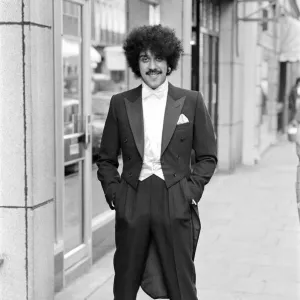 Phil Lynott of Thin Lizzy modelling clothes from Saville Row, London