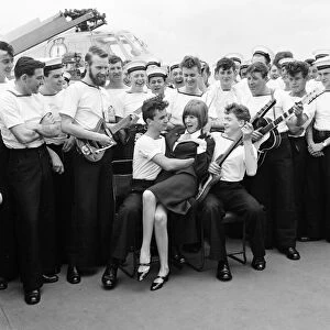 Pop singer Cilla Black visits the missile destroyer HMS London to open the closed circuit