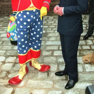 Prince Charles meets Boo Boo the clown at the Princess Youth Business Trust