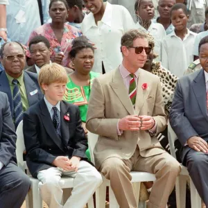 Prince Charles and his son Prince Harry visit the village of Dukuduku in South Africa